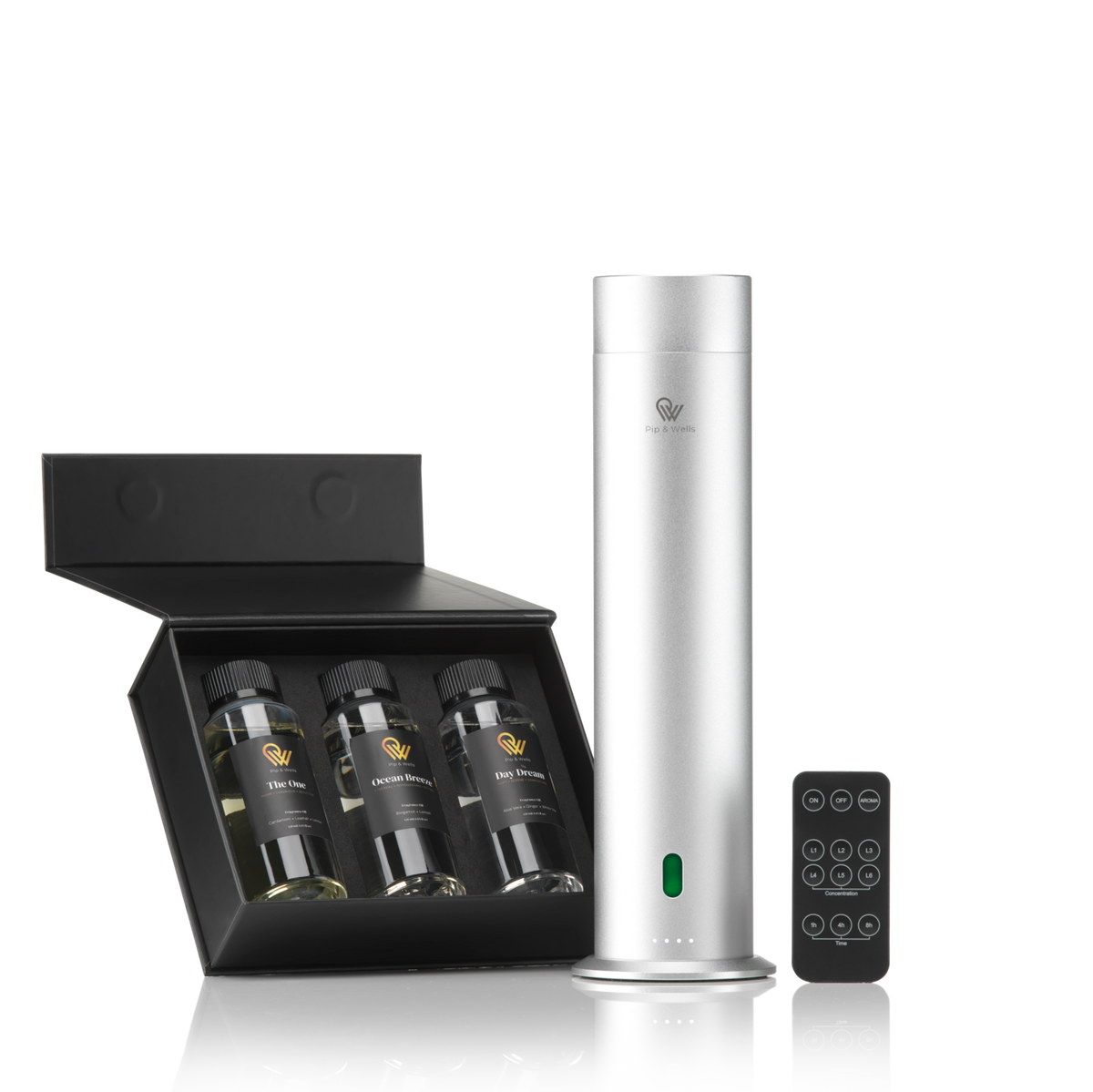 Silver or black diffuser: a silver Pip & Wells Pure One aroma diffuser beside a black fragrance set.